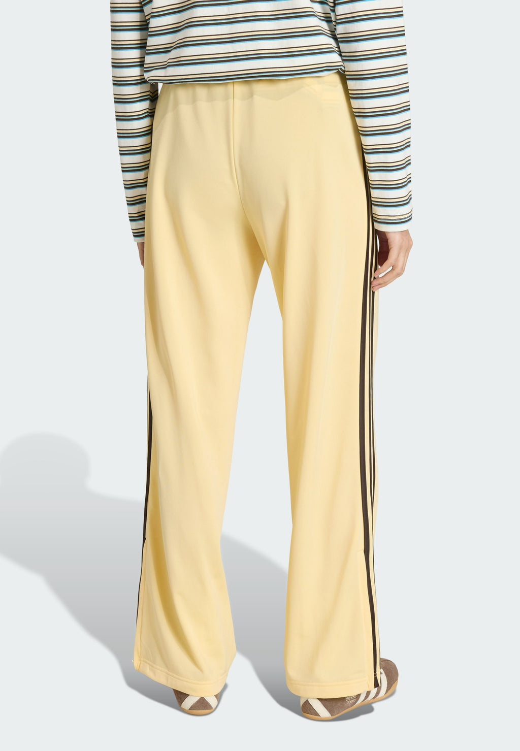 LOOSE - Tracksuit bottoms - orange tint