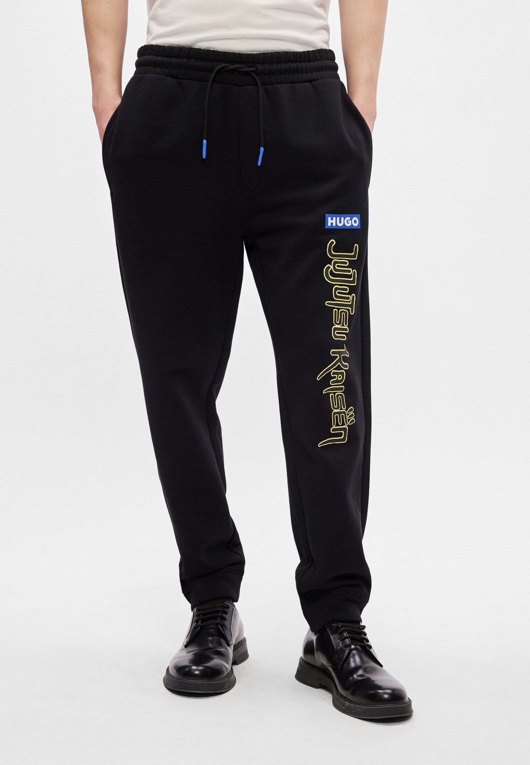 X JUJUTSU KAISEN NIMAYTRO - Tracksuit bottoms - black