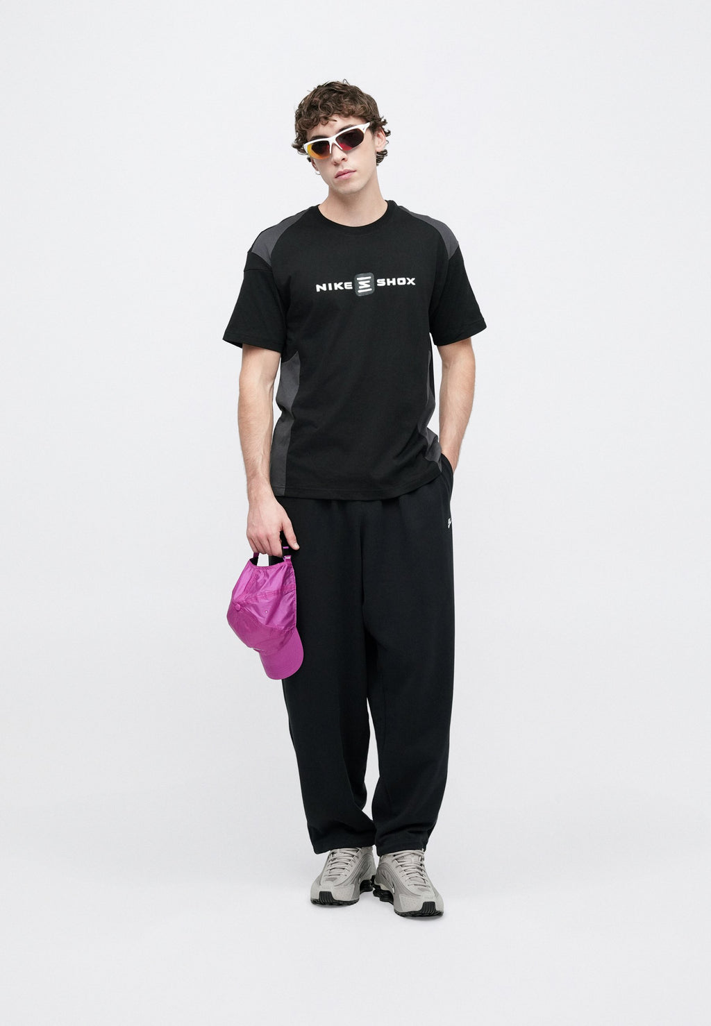 CLUB - Tracksuit bottoms - black/white