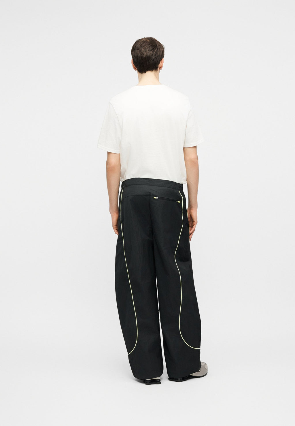 TOBI - Tracksuit bottoms - black/volt ice/cream