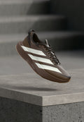 ADIZERO EVO SL ATR M - Trainers - earth strata/off white/warm sandstone