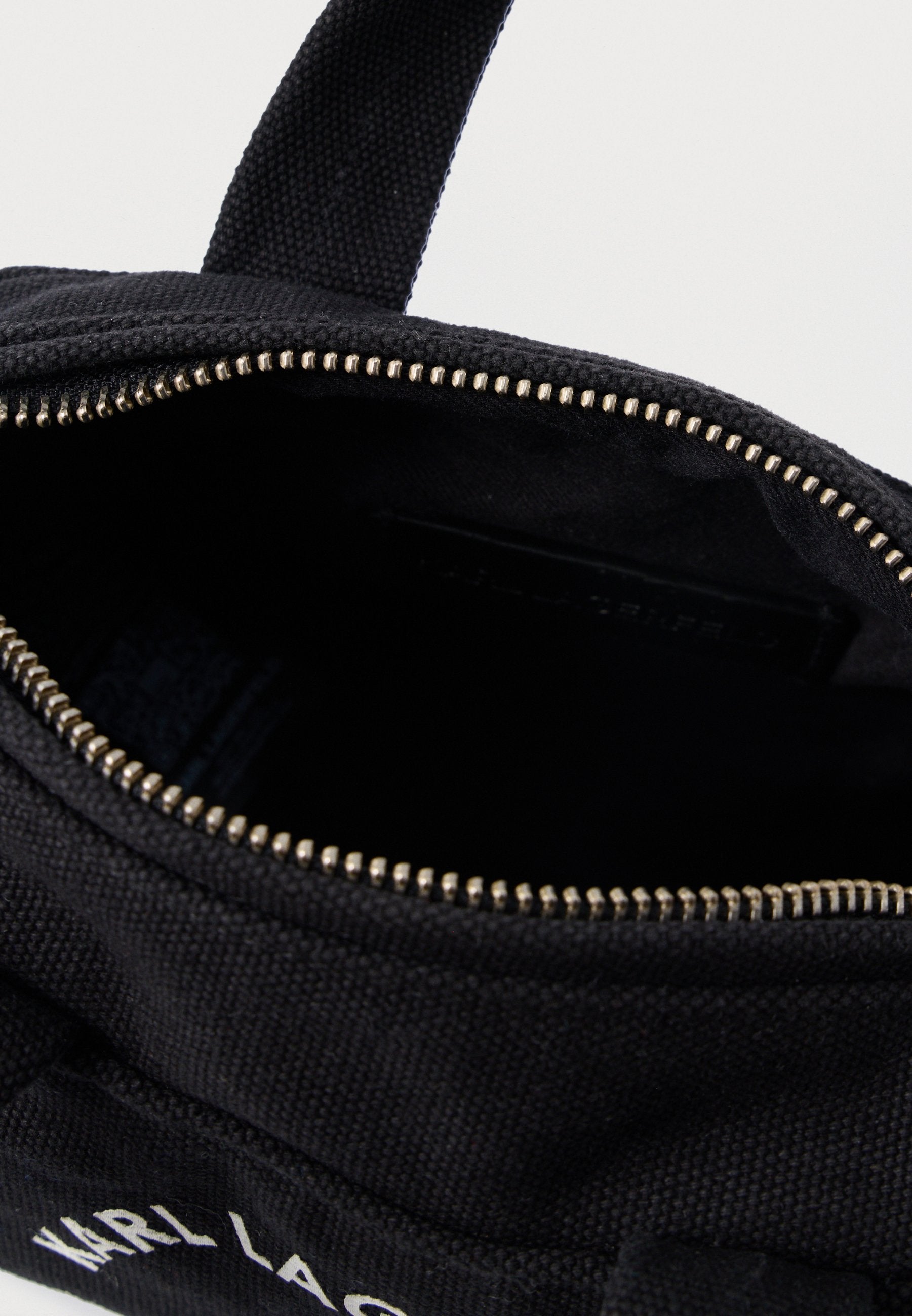 MINI DUFFLE - Handbag - black