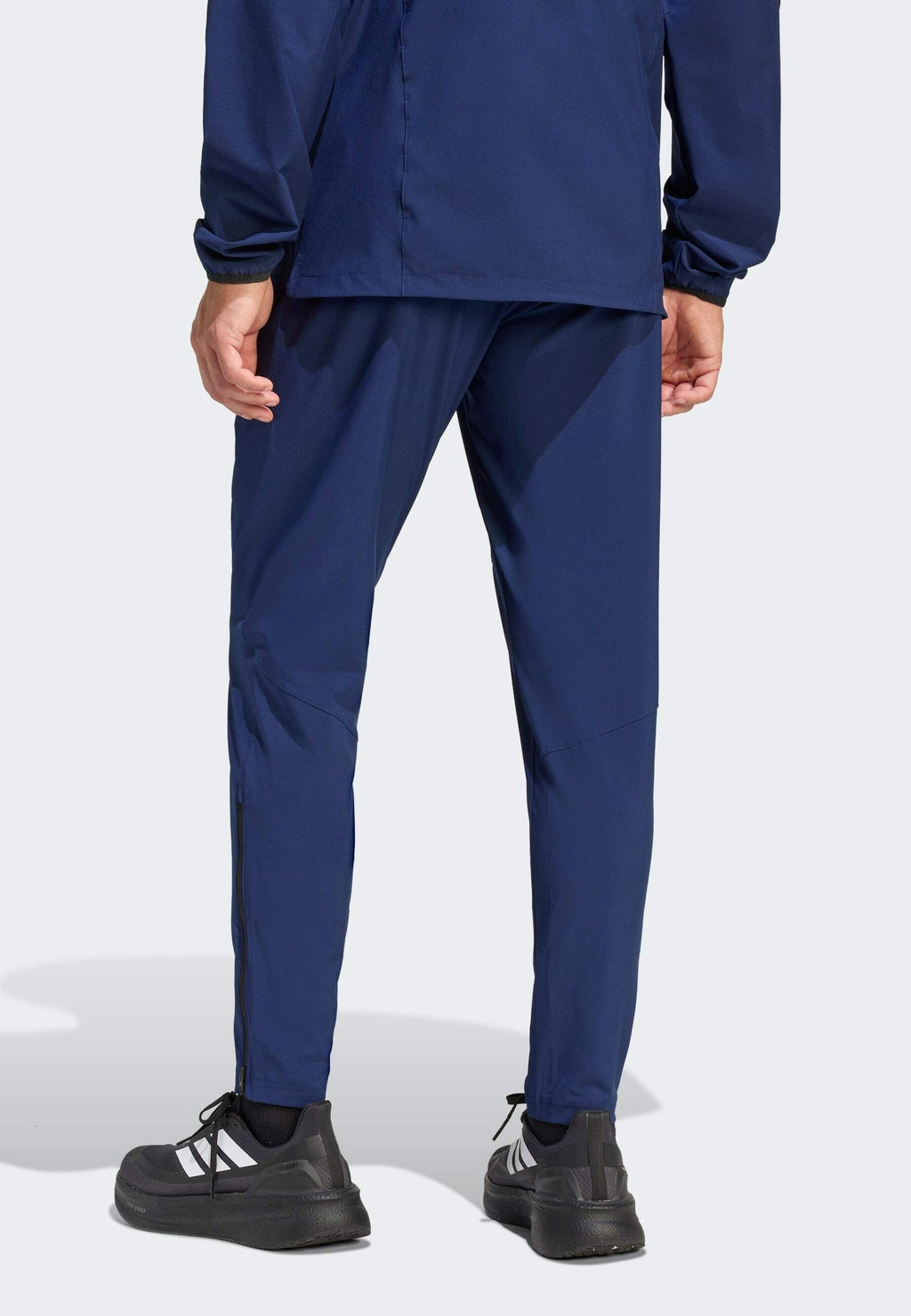 TIRO TRAVEL  - Tracksuit bottoms - team navy blue/black