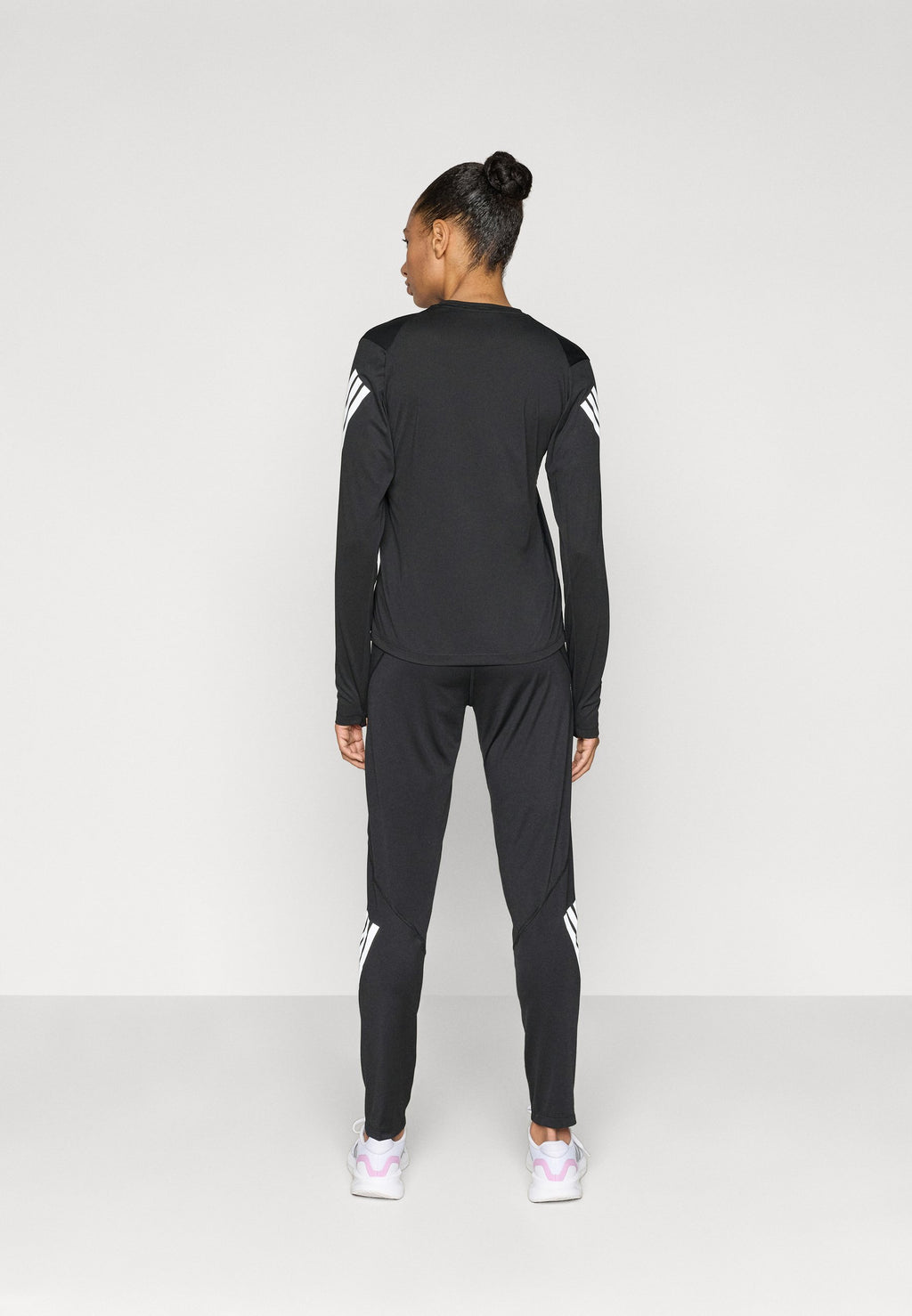 ADI365 - Tracksuit bottoms - black