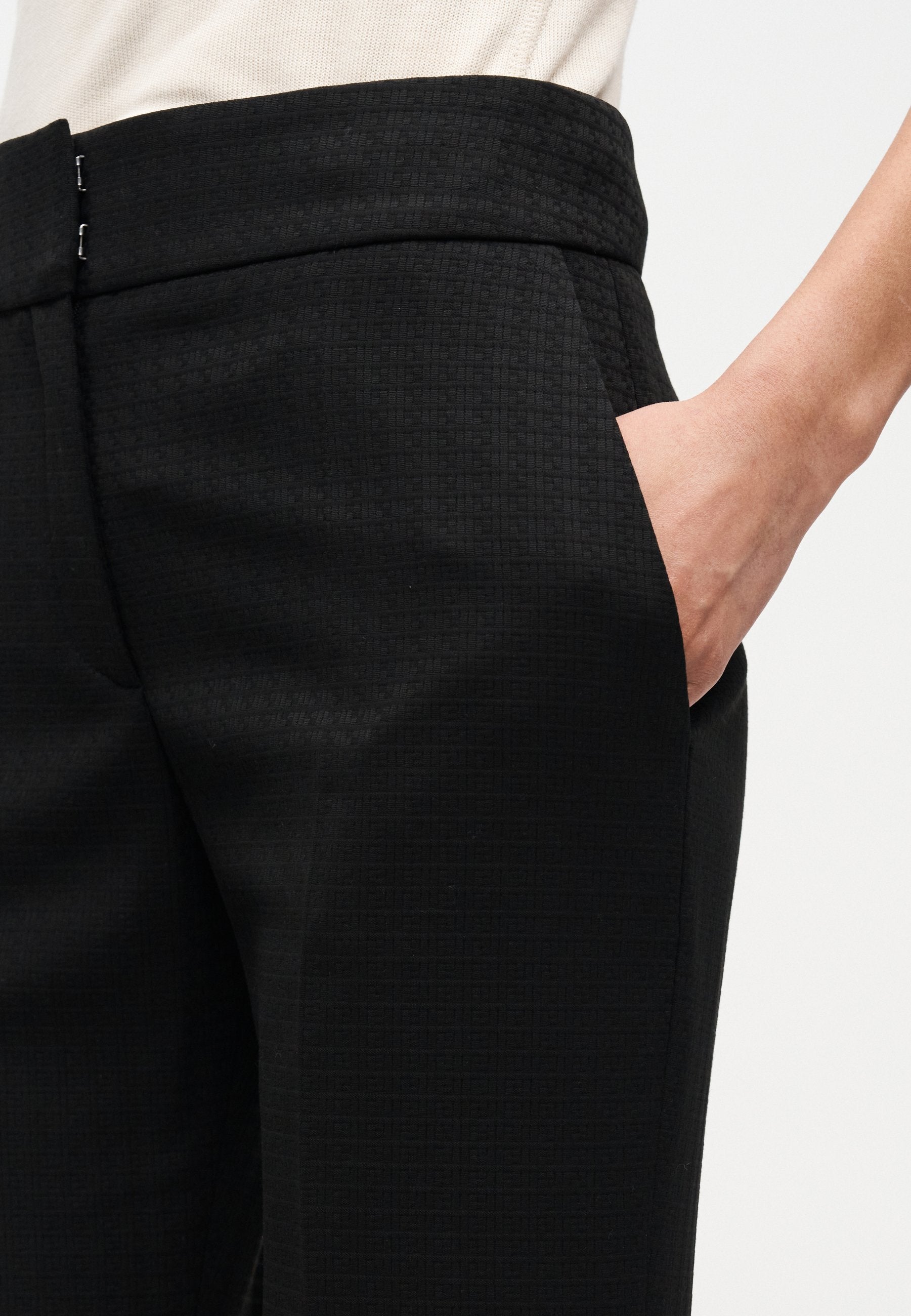 HOVANIA - Trousers - black