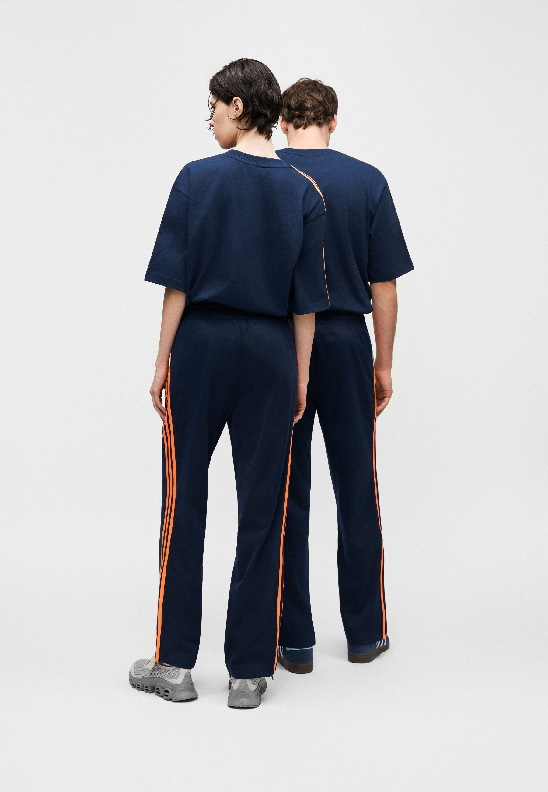 FIREBIRD TP - Tracksuit bottoms - night indigo/lucid orange