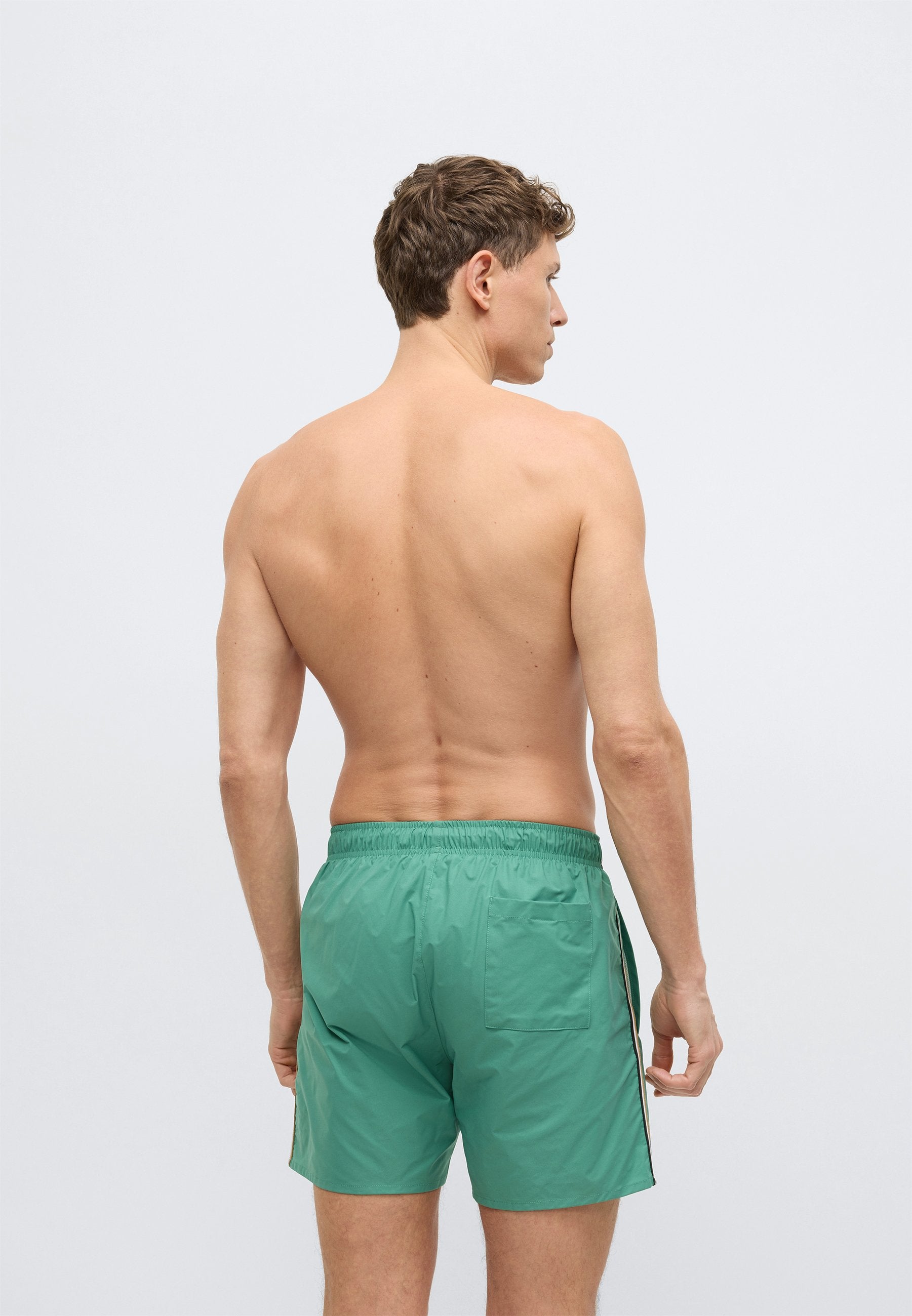 ICONIC - Swimming shorts - open green