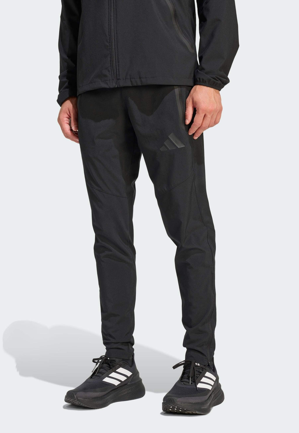 TIRO TRAVEL  - Tracksuit bottoms - black   black