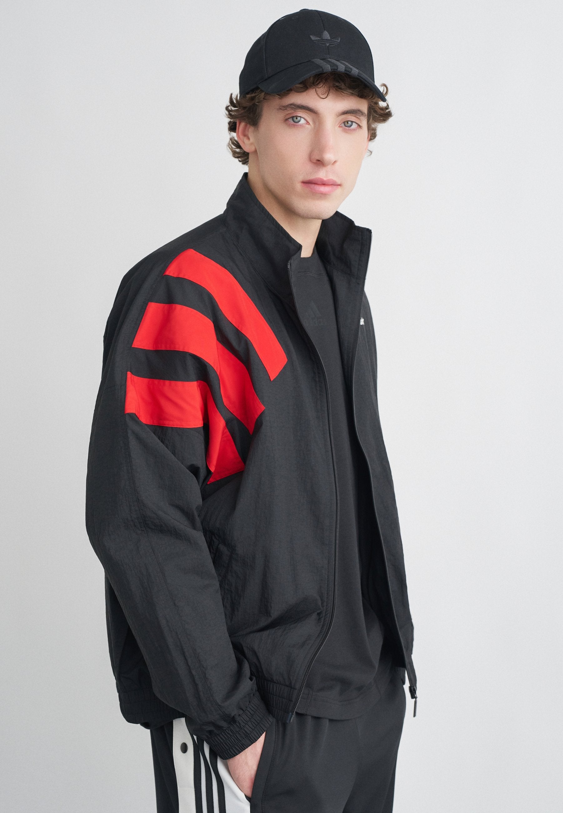 ARCH - Training jacket - black/better scarlet