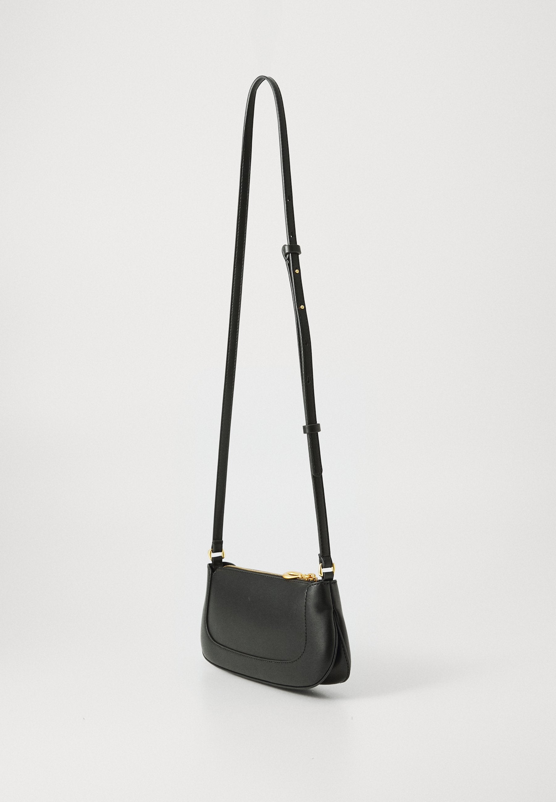 ENGRAVED - Cross body bag - black