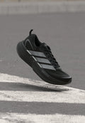 SUPERNOVA GLIDE M - Chaussures de running sur route - core black/iron metallic/grey five