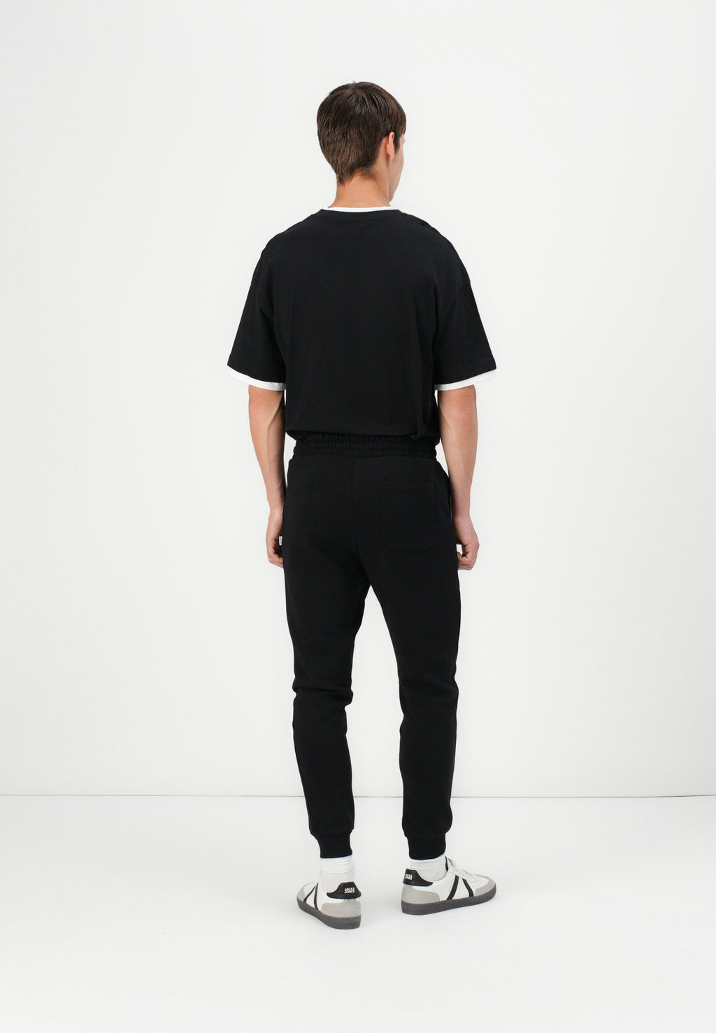 Regular Fit - Tracksuit bottoms - black