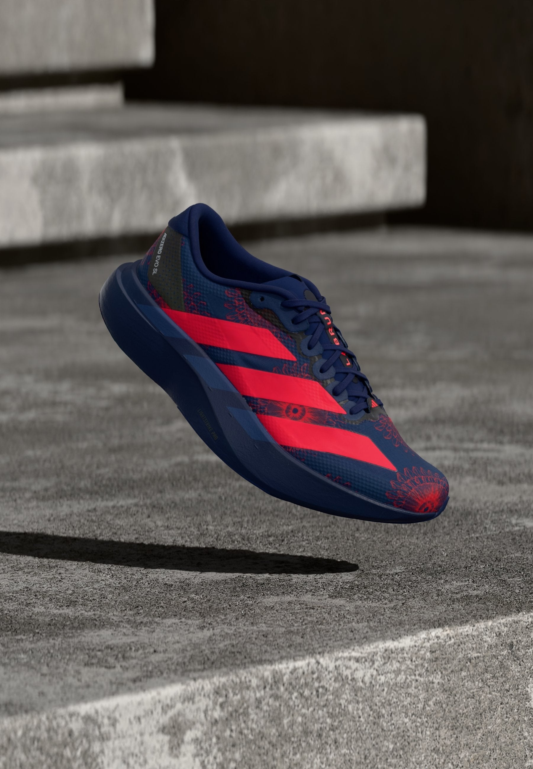 ADIZERO EVO SL - Trainers - dark blue/lucid red/muted purple