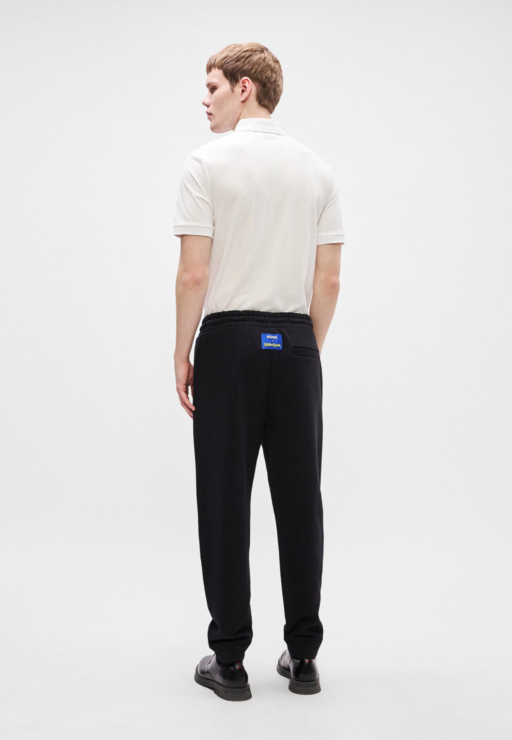 X JUJUTSU KAISEN NIMAYTRO - Tracksuit bottoms - black