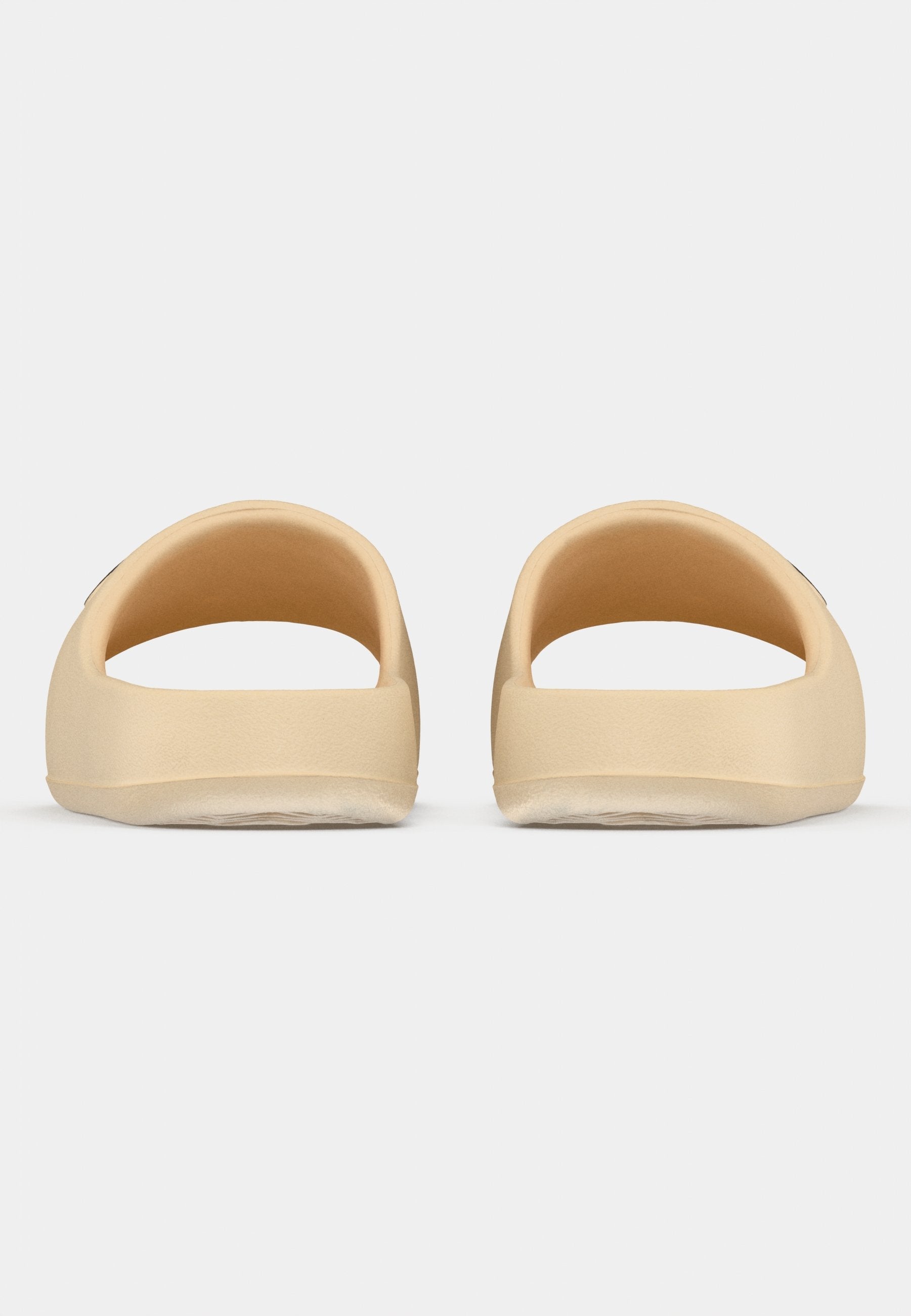 ADILETTE 00S UNISEX - Mules - sand strata/core black