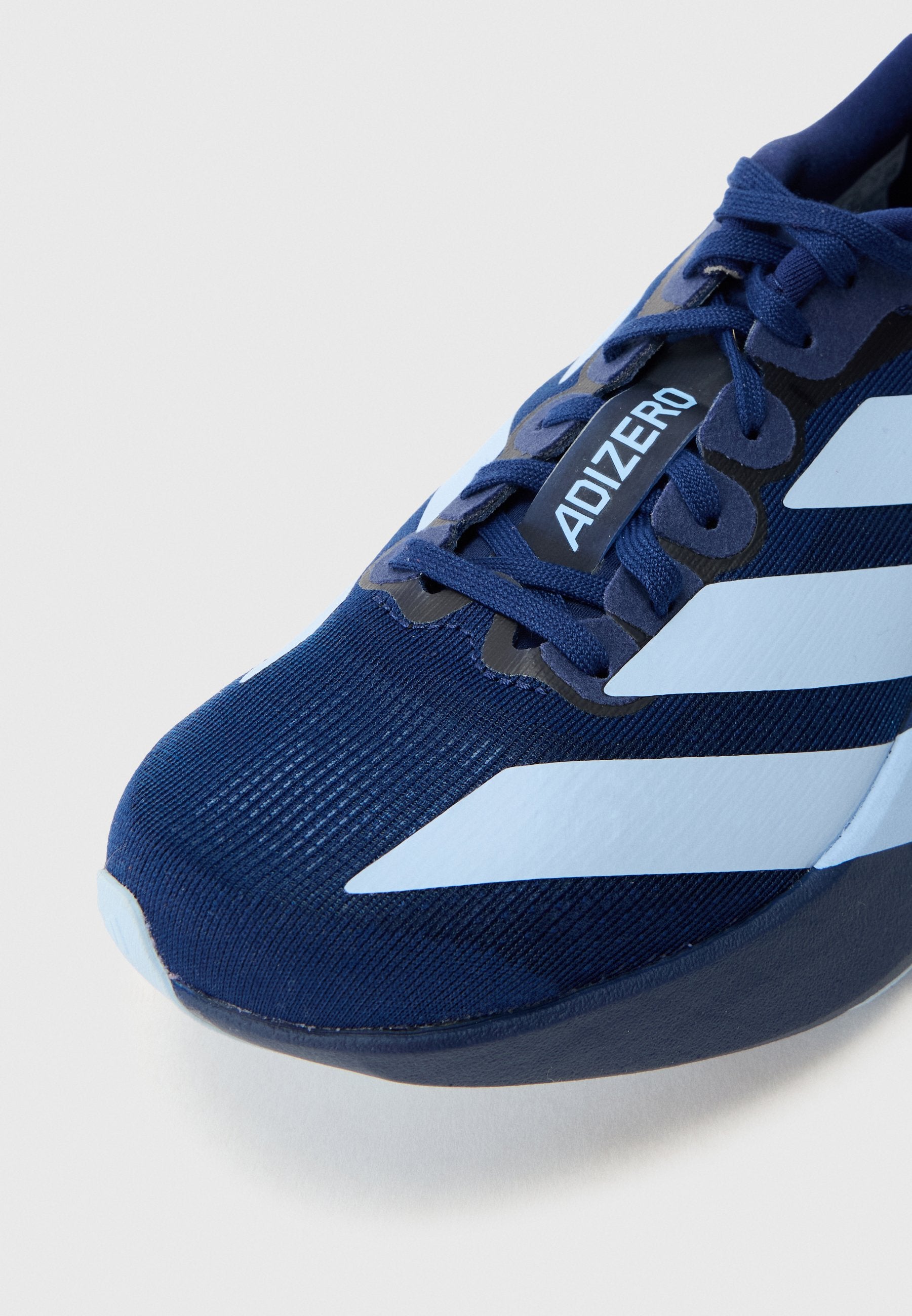 ADIZERO EVO SL J UNISEX - Chaussures de running sur route - bleu foncé/bleu fluo/noir