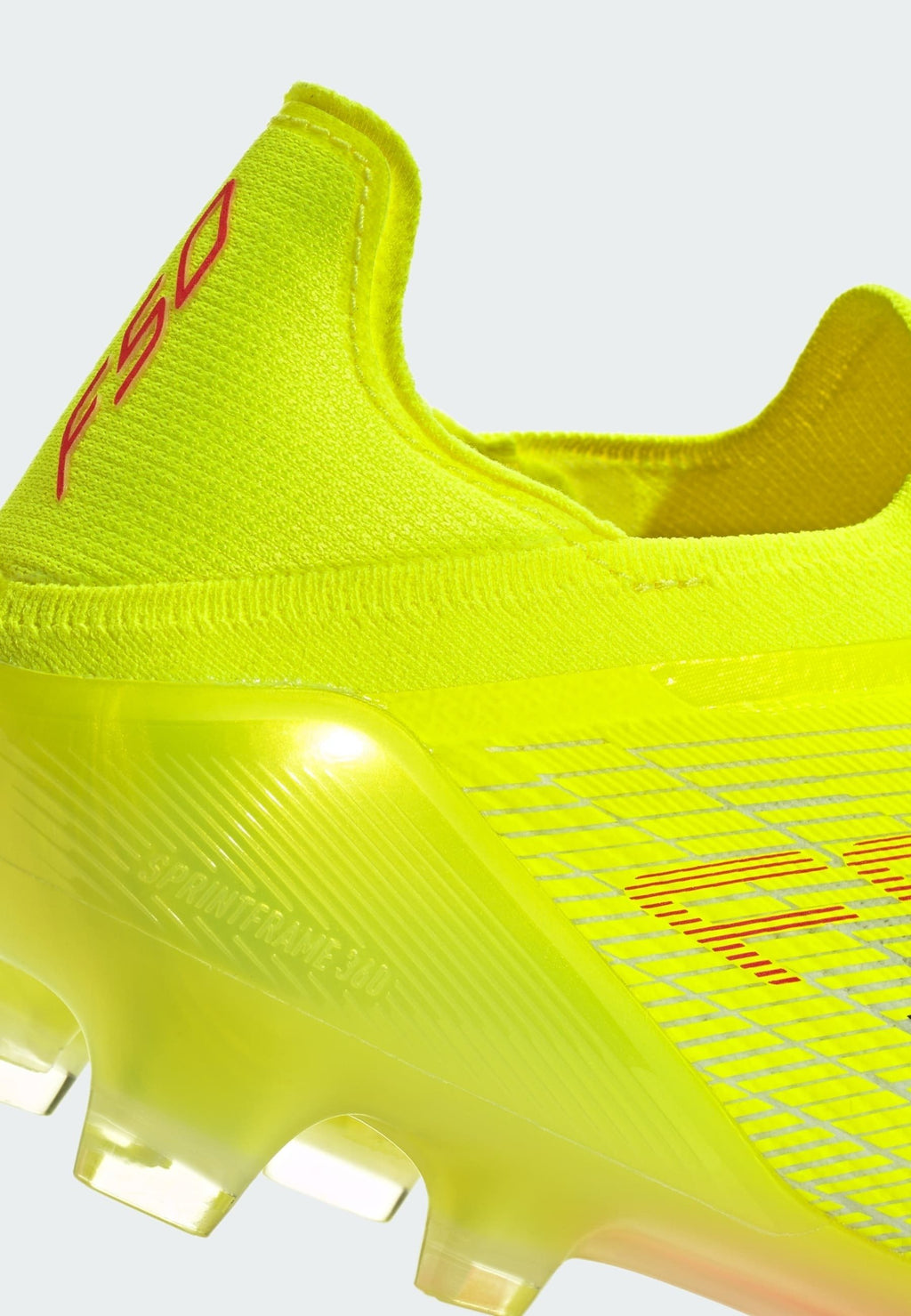 F50 ELITE LACELESS FG - Chaussures de football pour terrain sec - jaune solaire/noir/rouge vif