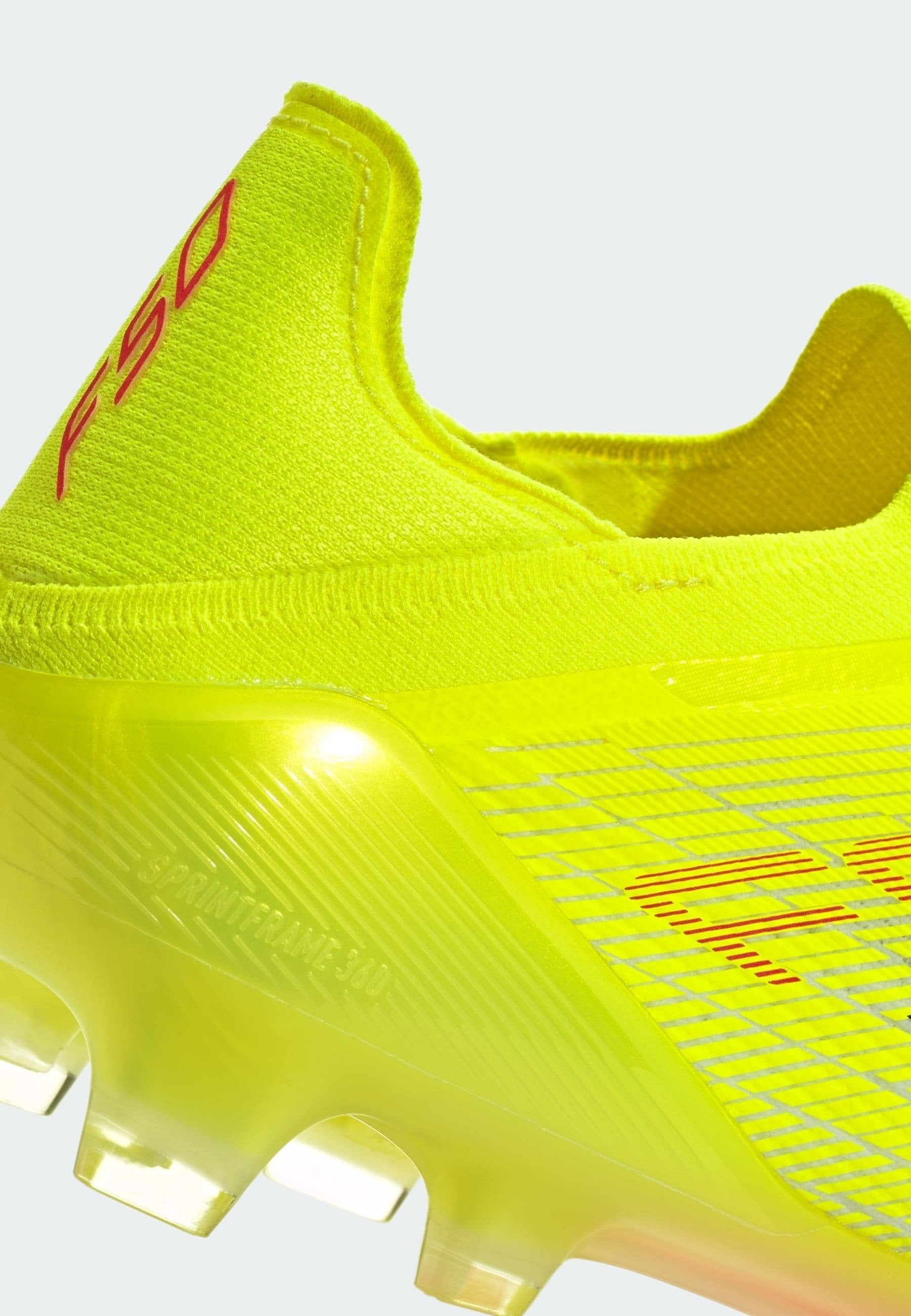 F50 ELITE LACELESS FG - Chaussures de football pour terrain sec - jaune solaire/noir/rouge vif
