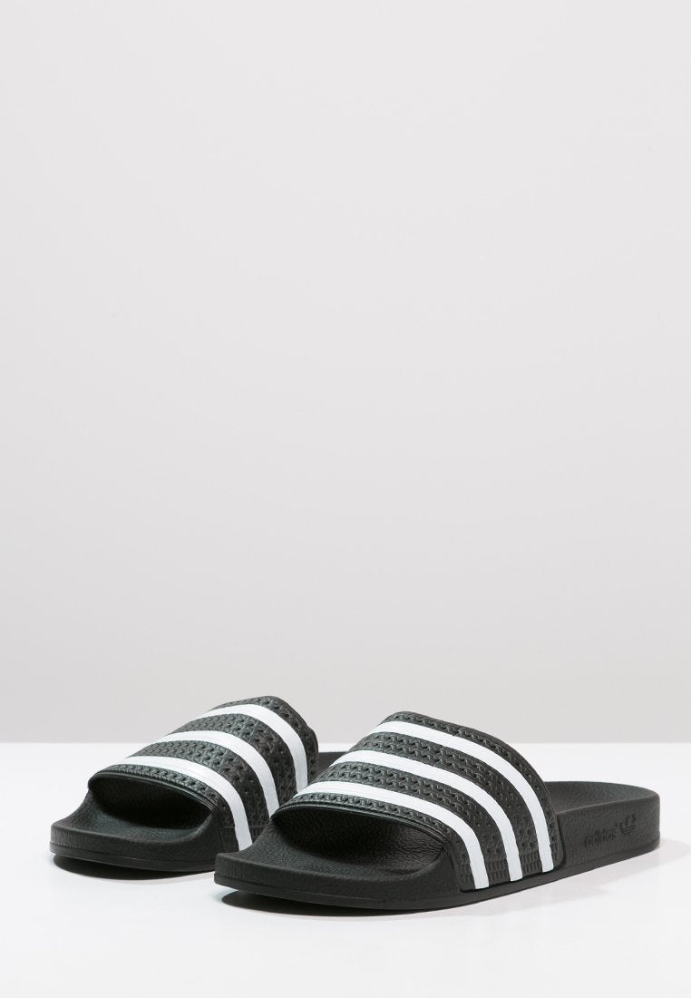 ADILETTE - Pool slides - black/white