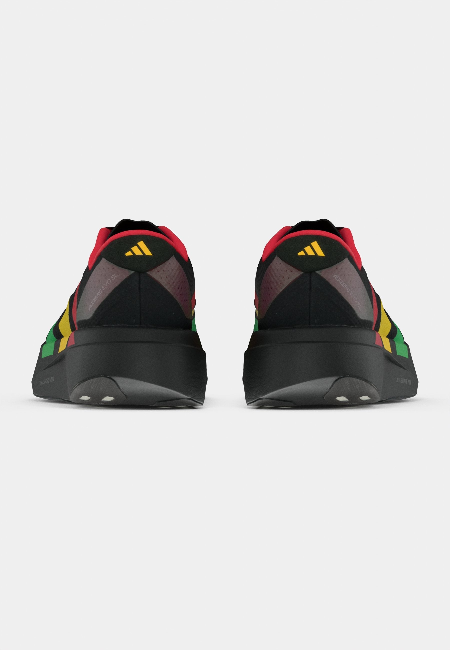 ADIZERO EVO SL - Trainers - core black/vivid green/bold gold-coloured