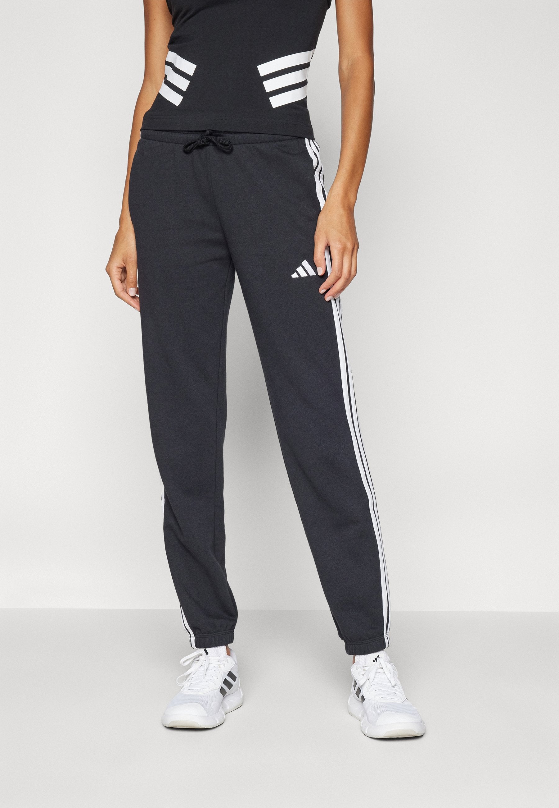 ESSENTIALS 3 STRIPES FRENCH TERRY CUFFED - Tracksuit bottoms - black/white