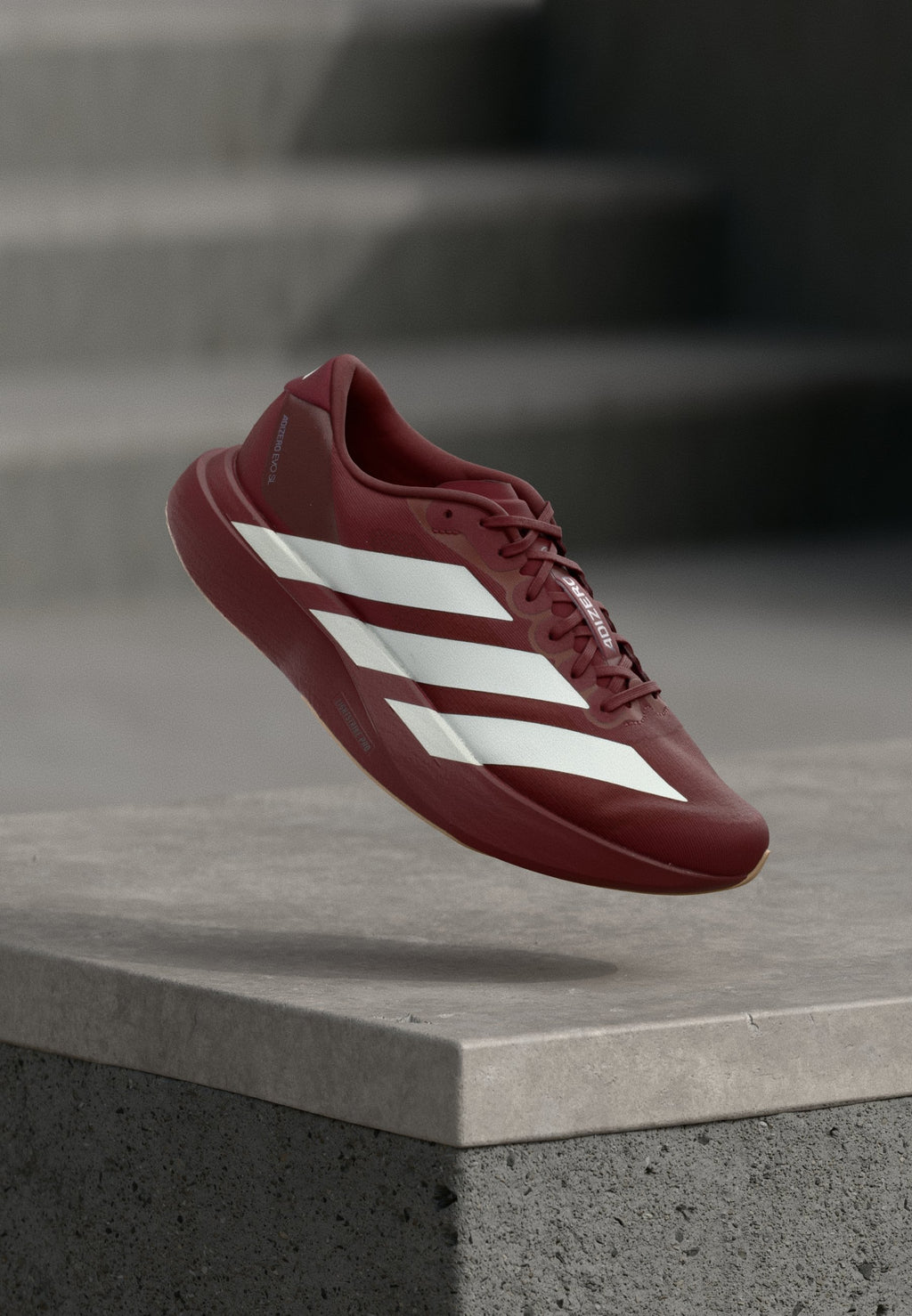 ADIZERO EVO SL M - أحذية رياضية - أحمر ظل/أبيض غير مصقول/فضي معدني
