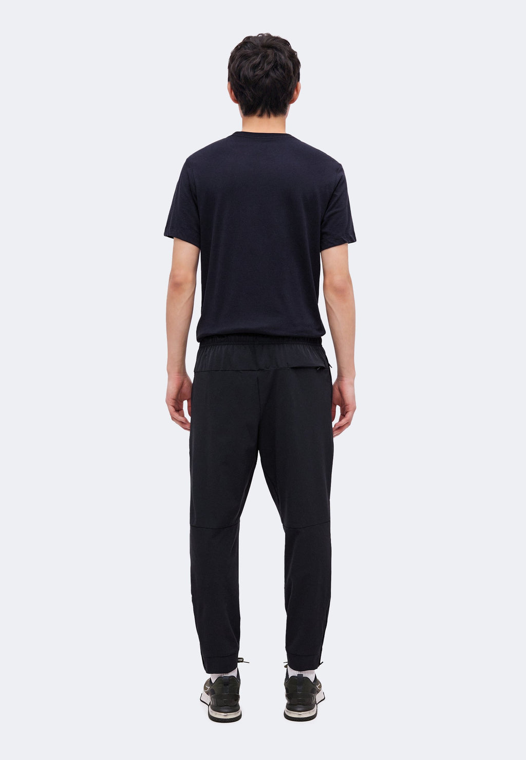 UNLIMITED - Tracksuit bottoms - black