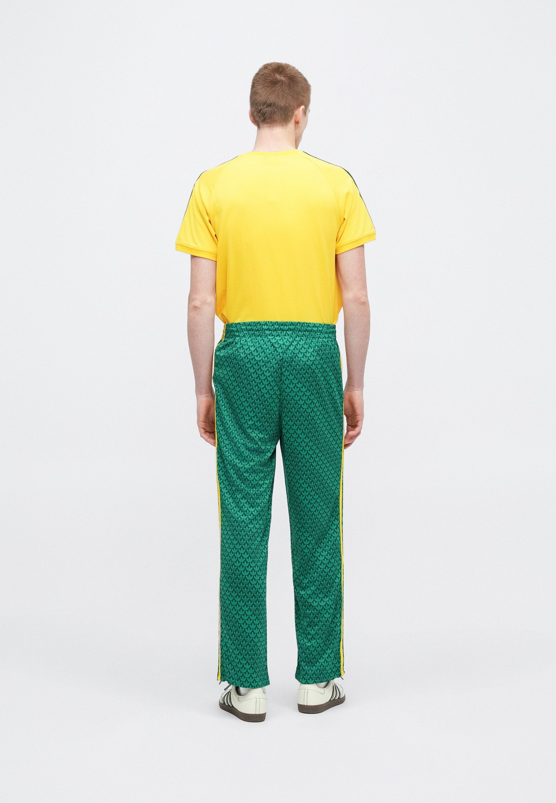 FIREBIRD MONOGRAM - Tracksuit bottoms - collegiate green