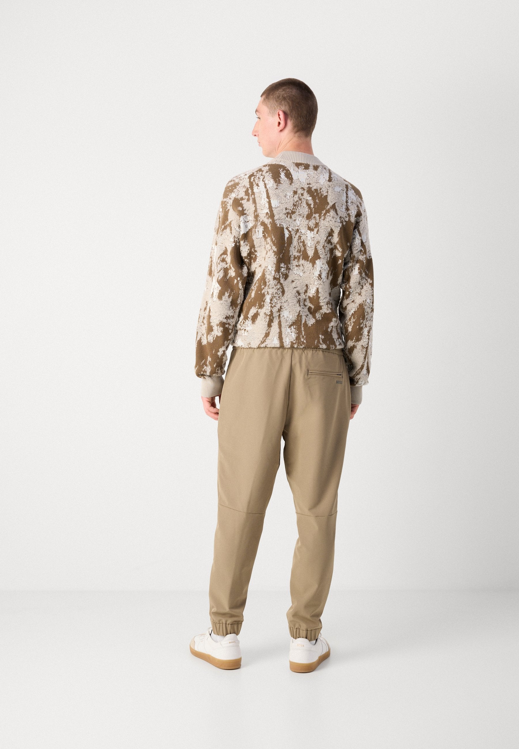 T_FLEX - Trousers - light/pastel green