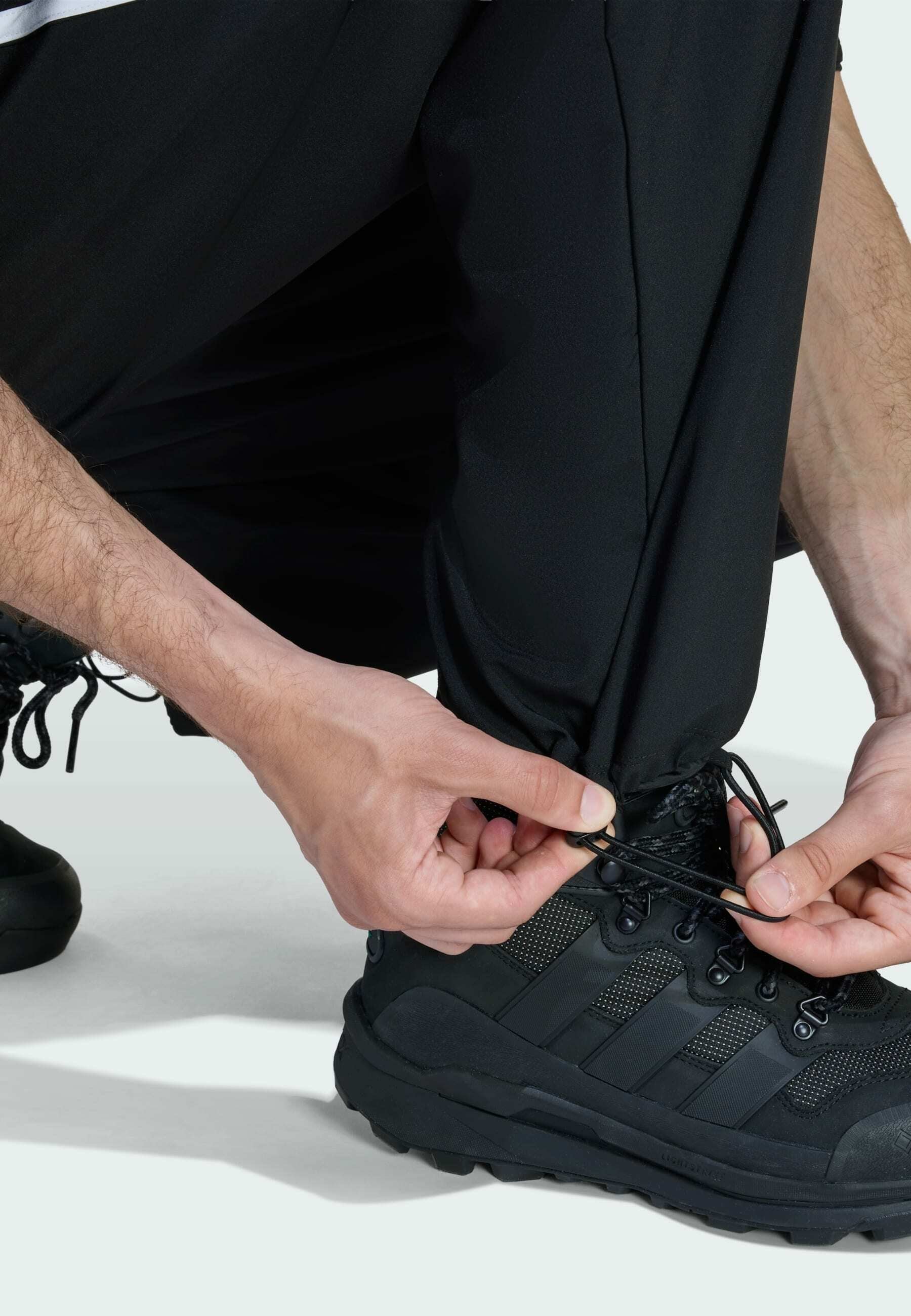 TEAMGEIST - Tracksuit bottoms - black   black   white