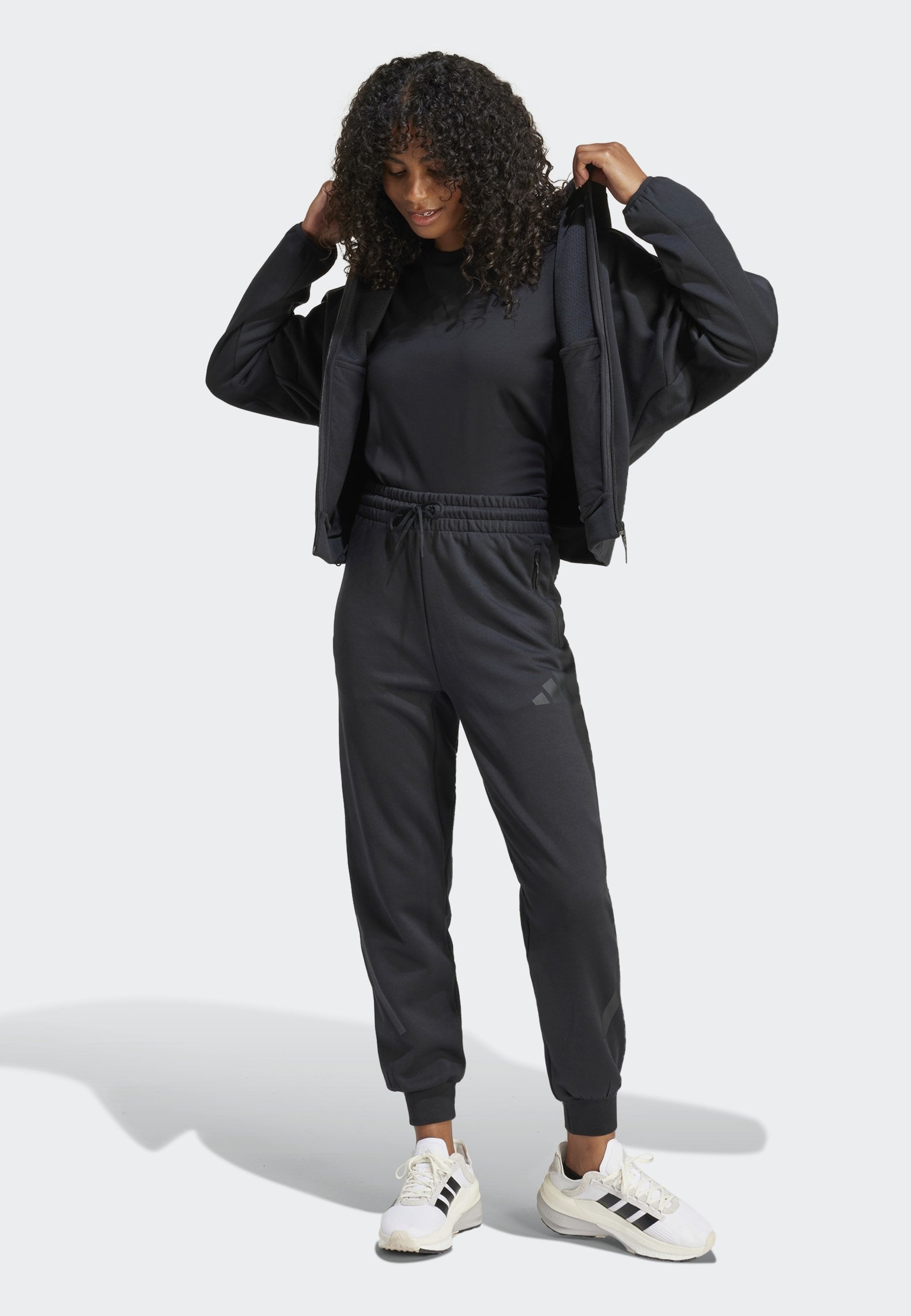 ADIDAS Z.N.E. - Tracksuit bottoms - black
