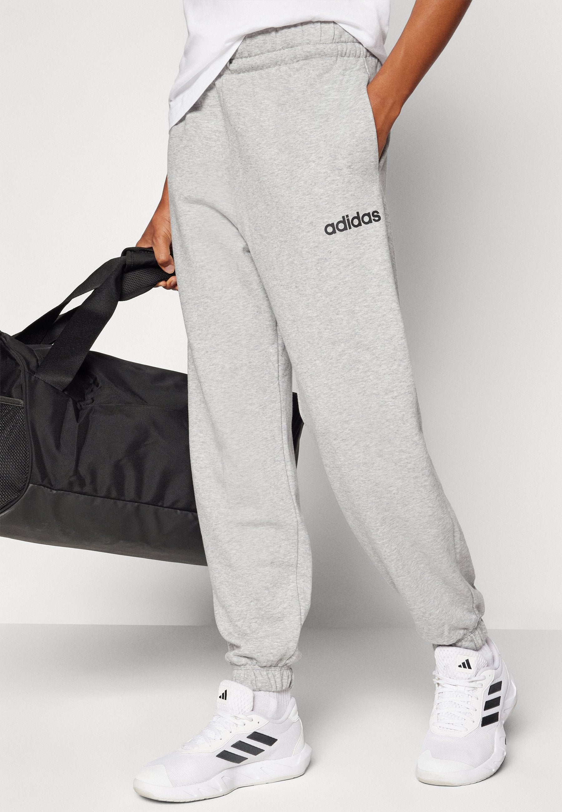 ESSENTIALS LINEAR FRENCH TERRY CUFFED - Tracksuit bottoms - medium grey heather/black