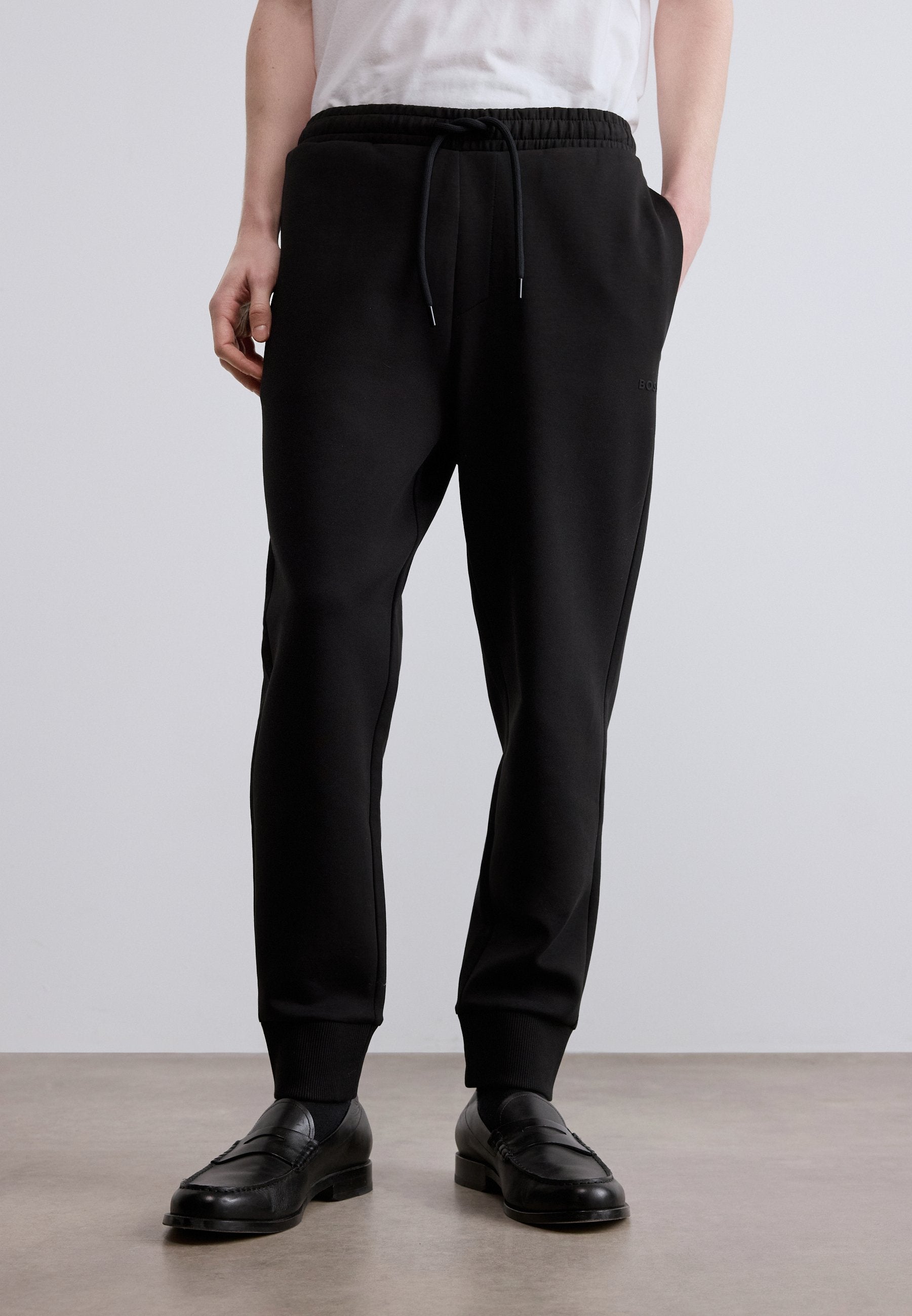 HADIKO - Tracksuit bottoms - black