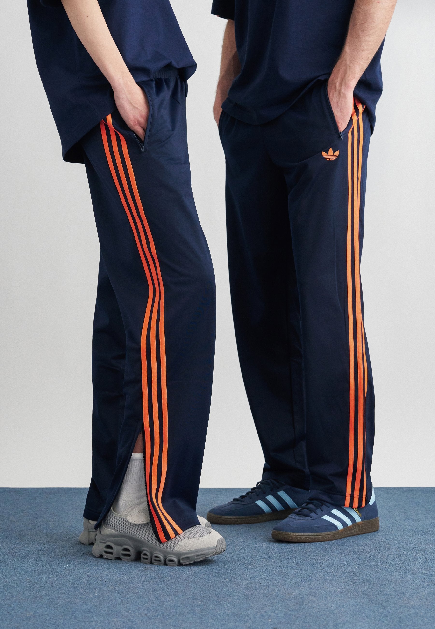 FIREBIRD TP - Tracksuit bottoms - night indigo/lucid orange