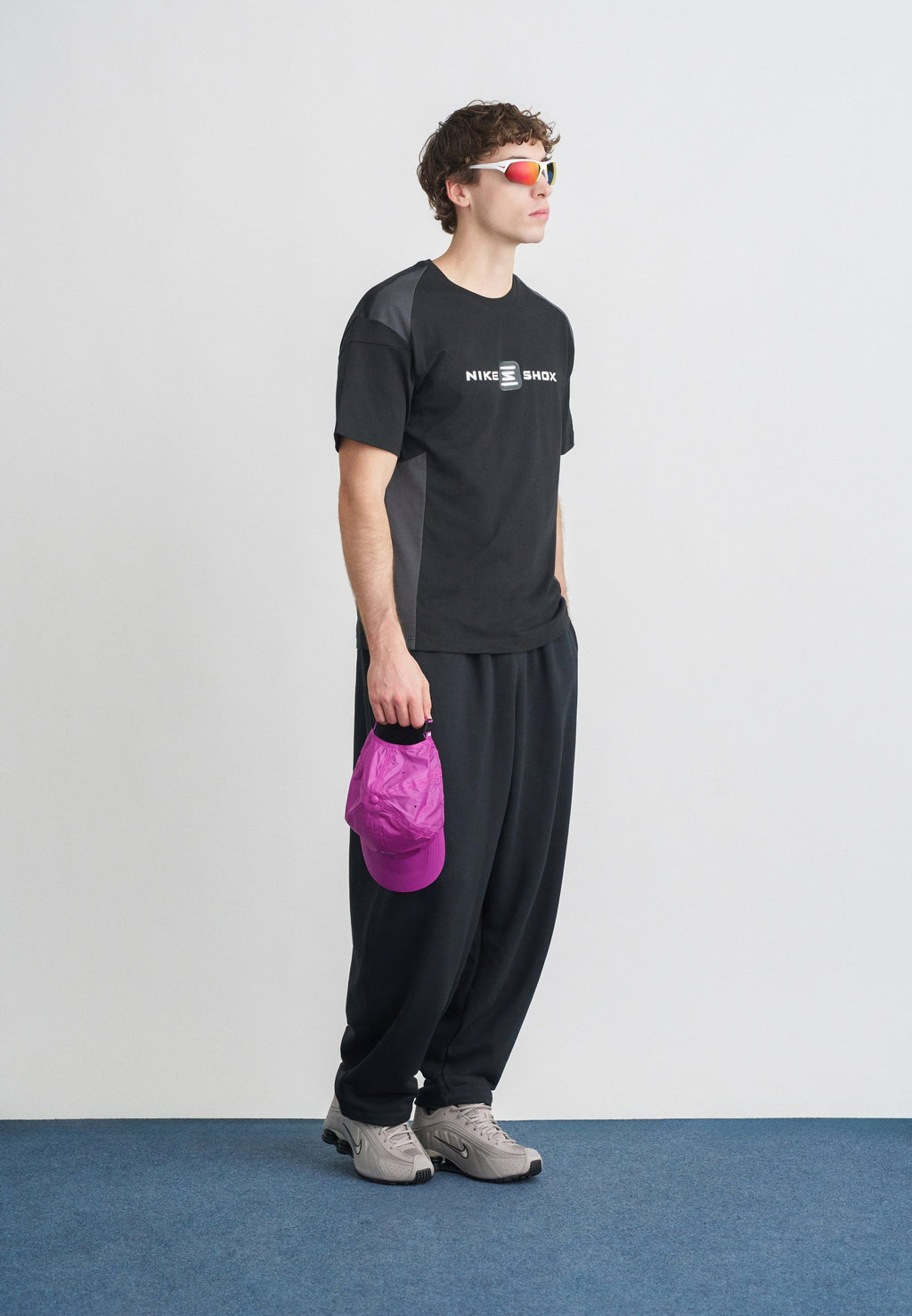 CLUB - Tracksuit bottoms - black/white