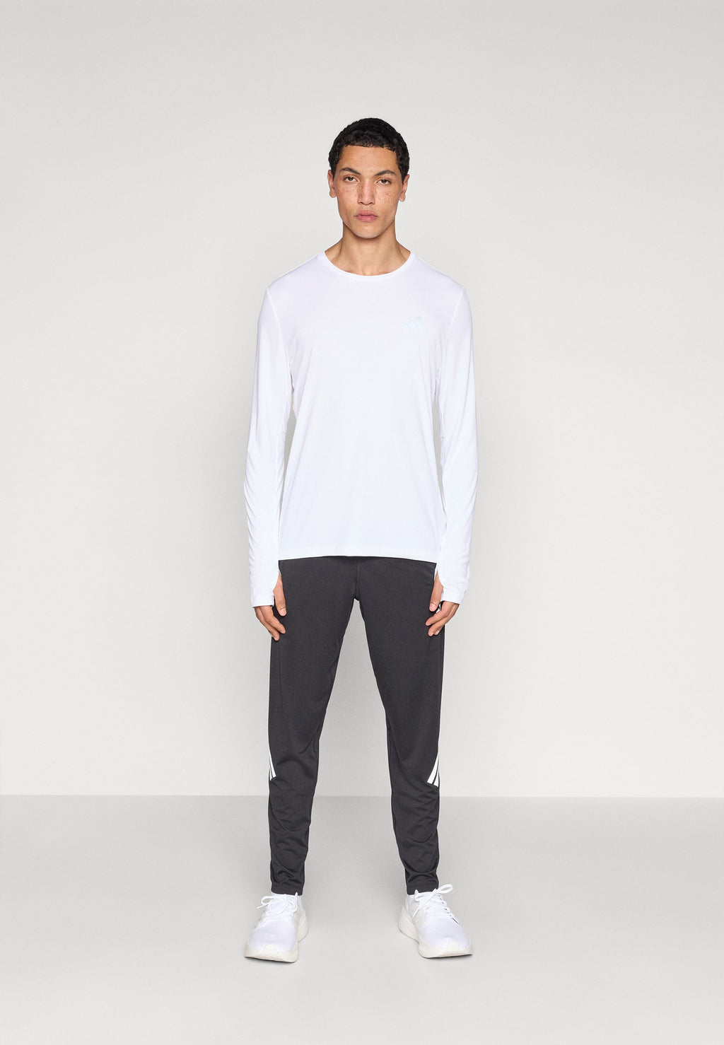 ADI365 - Tracksuit bottoms - black