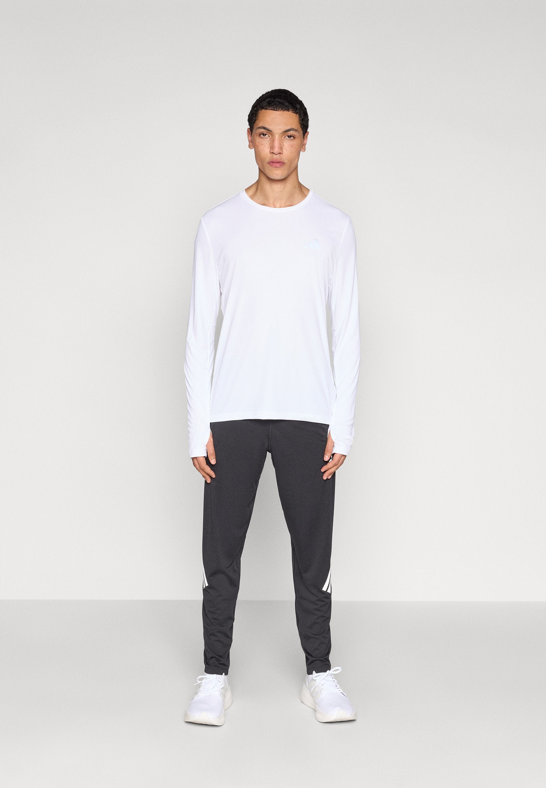 ADI365 - Tracksuit bottoms - black