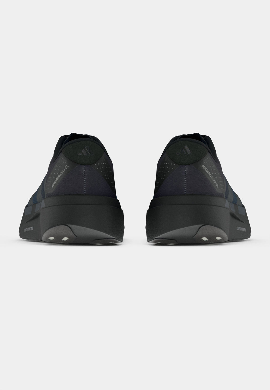 ADIZERO EVO SL WOVEN M - Trainers - black/dark blue