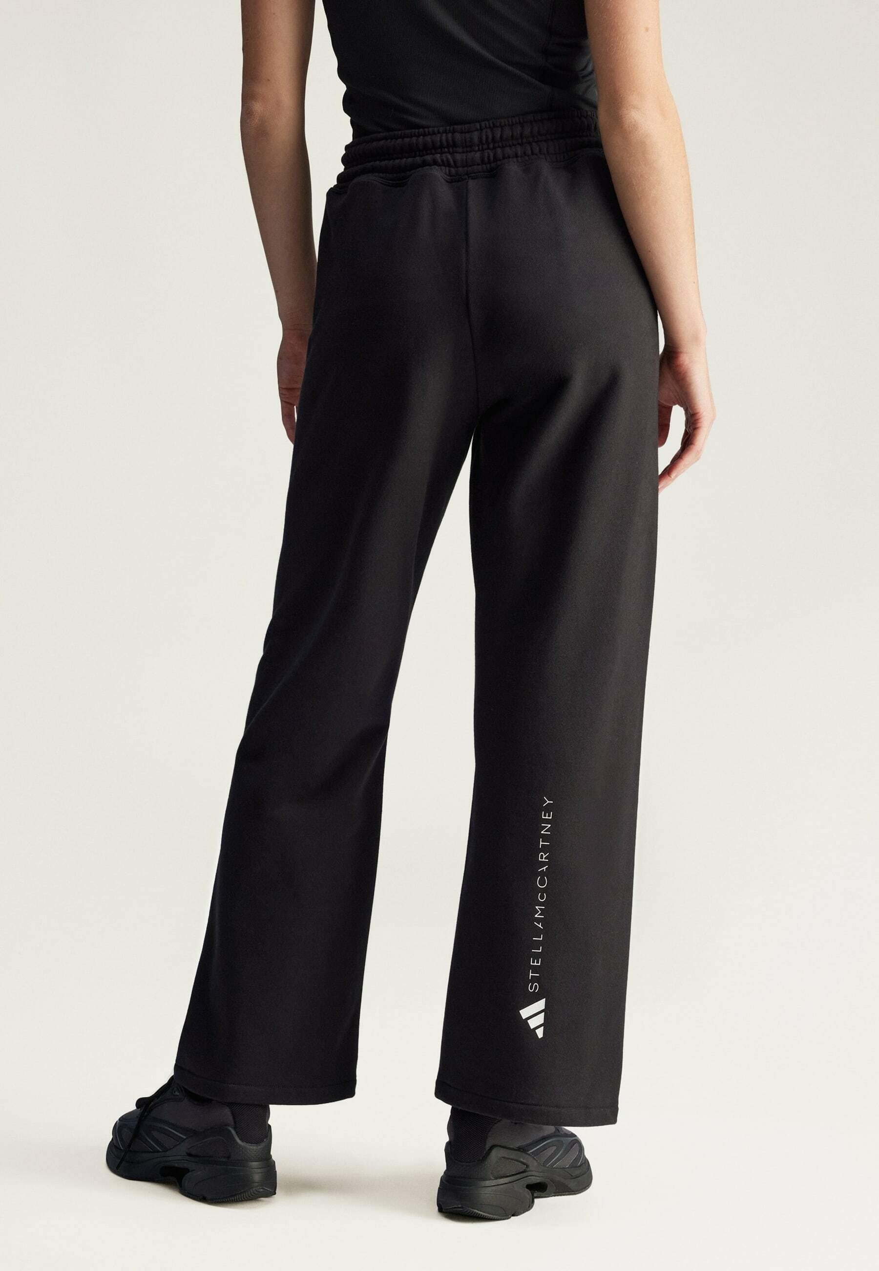 STRAIGHT - Tracksuit bottoms - black