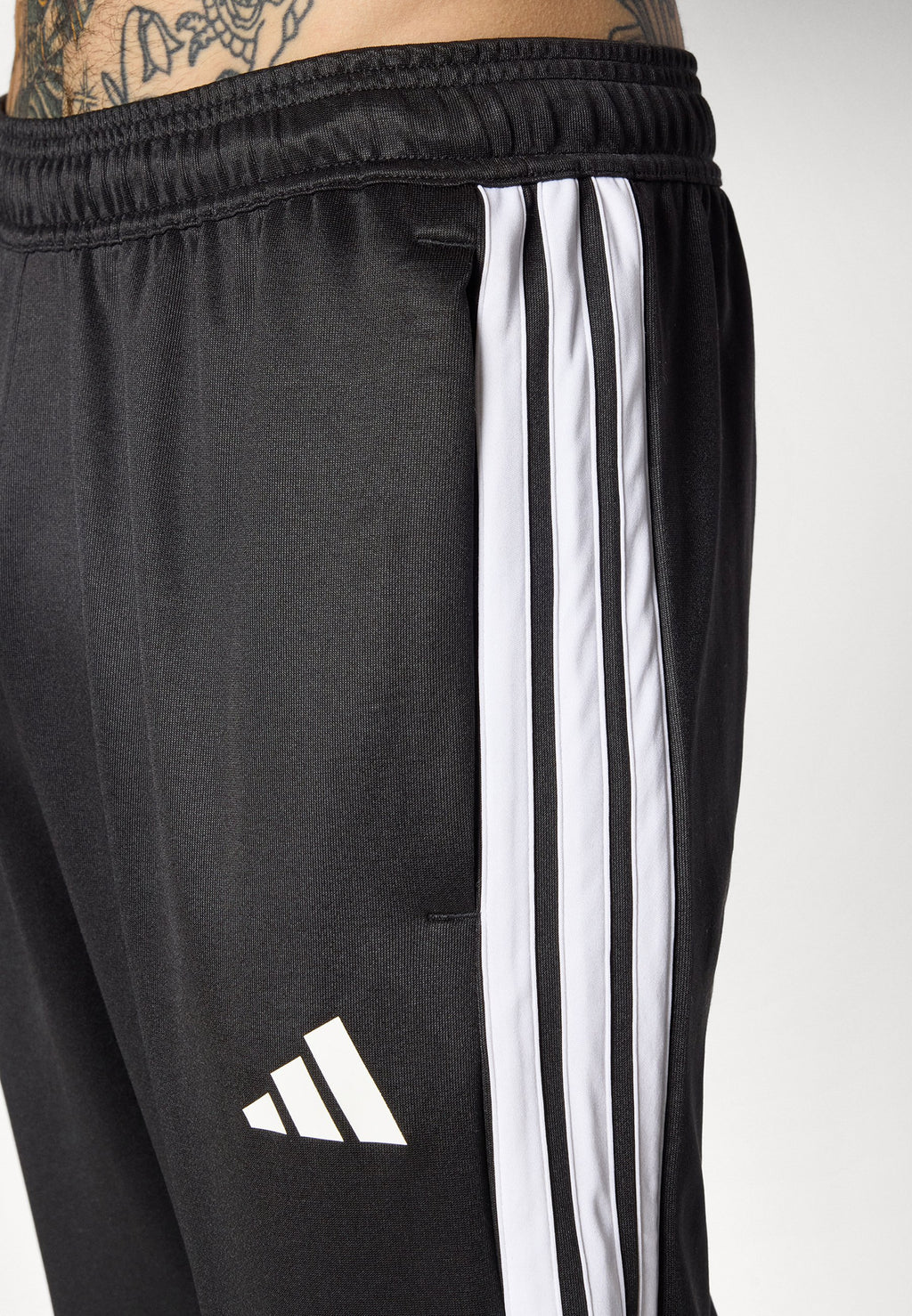 TIRO - Tracksuit bottoms - black/white