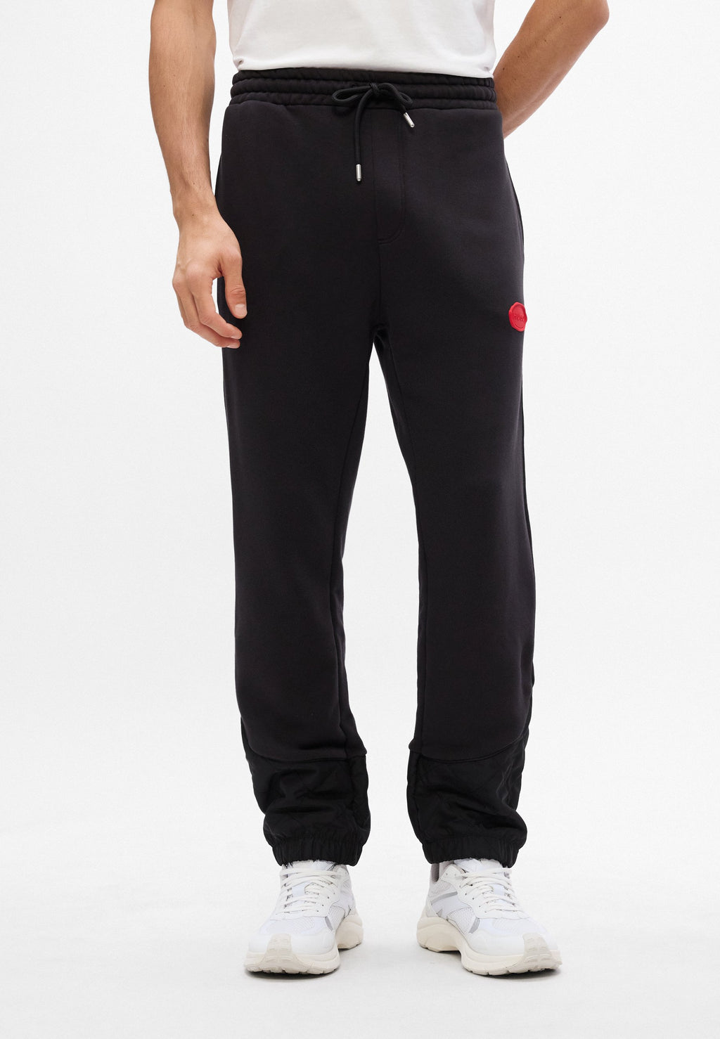 DILVANOS - Tracksuit bottoms - black
