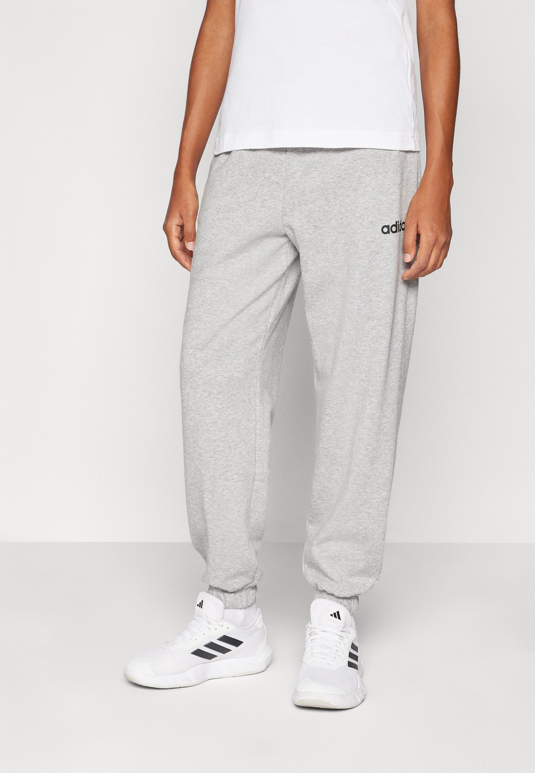 ESSENTIALS LINEAR FRENCH TERRY CUFFED - Tracksuit bottoms - medium grey heather/black