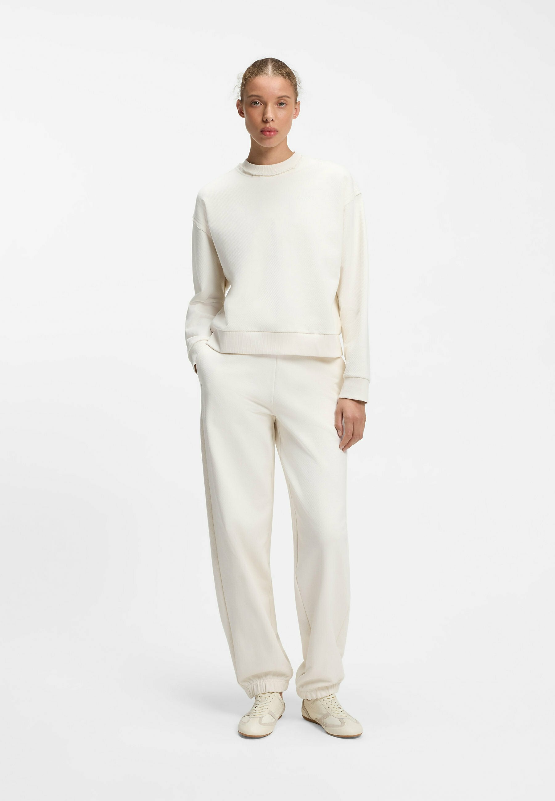 NUEMBRIE_B - Tracksuit bottoms - natural ten