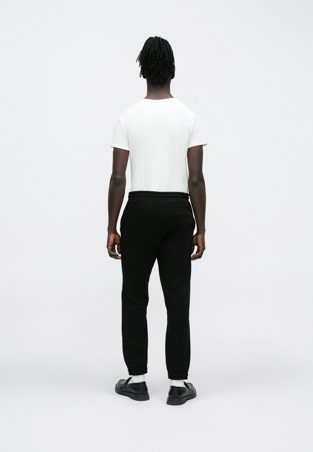 DANOPAN - Tracksuit bottoms - black