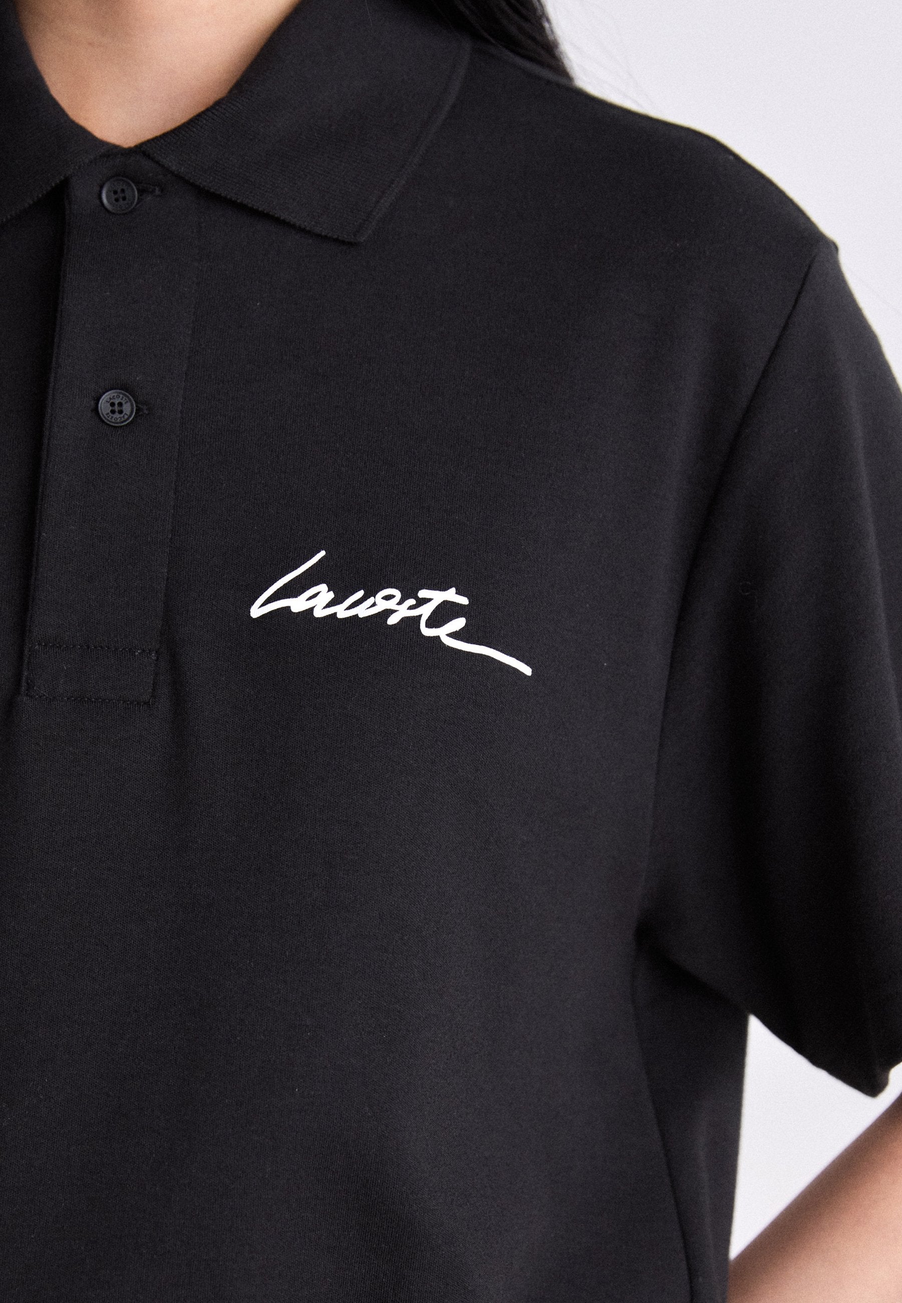 UNISEX - Polo shirt - black