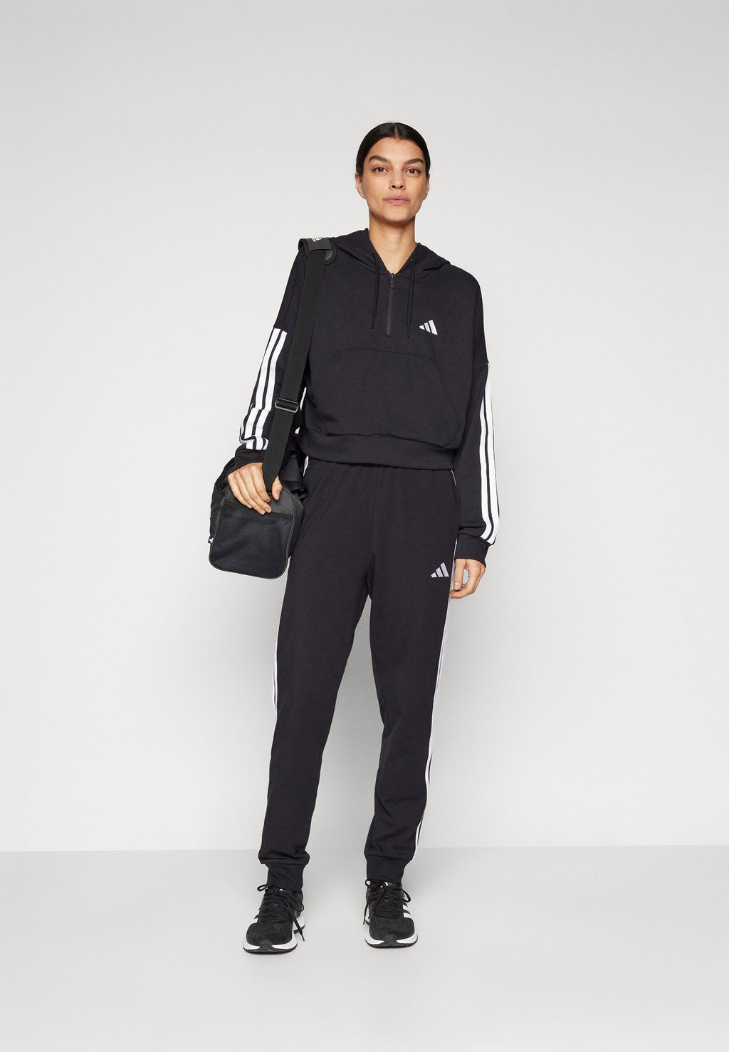 JOGGER - Tracksuit bottoms - black/white