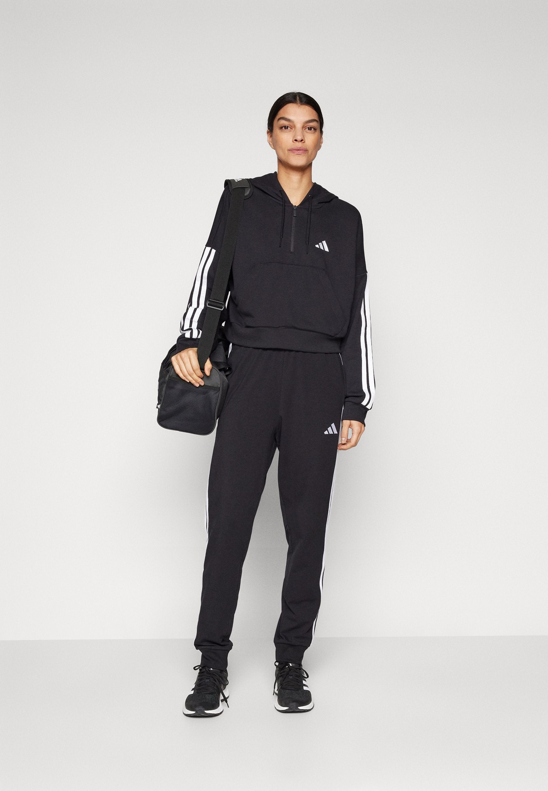 JOGGER - Tracksuit bottoms - black/white