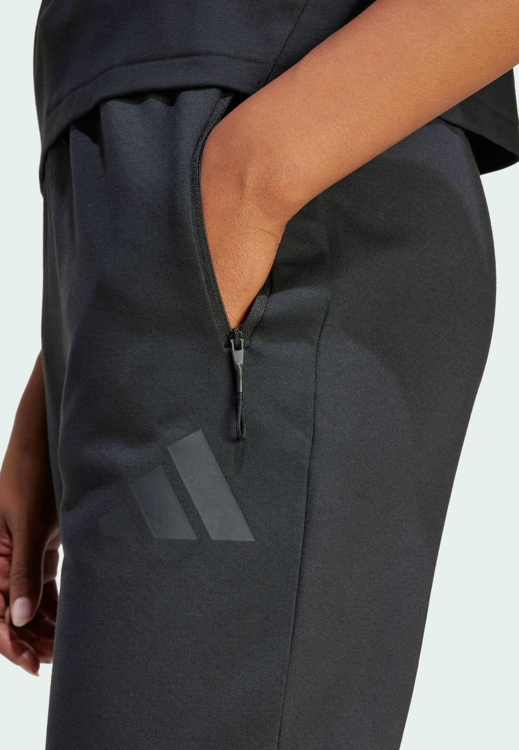 ADIDAS Z.N.E. - Tracksuit bottoms - black