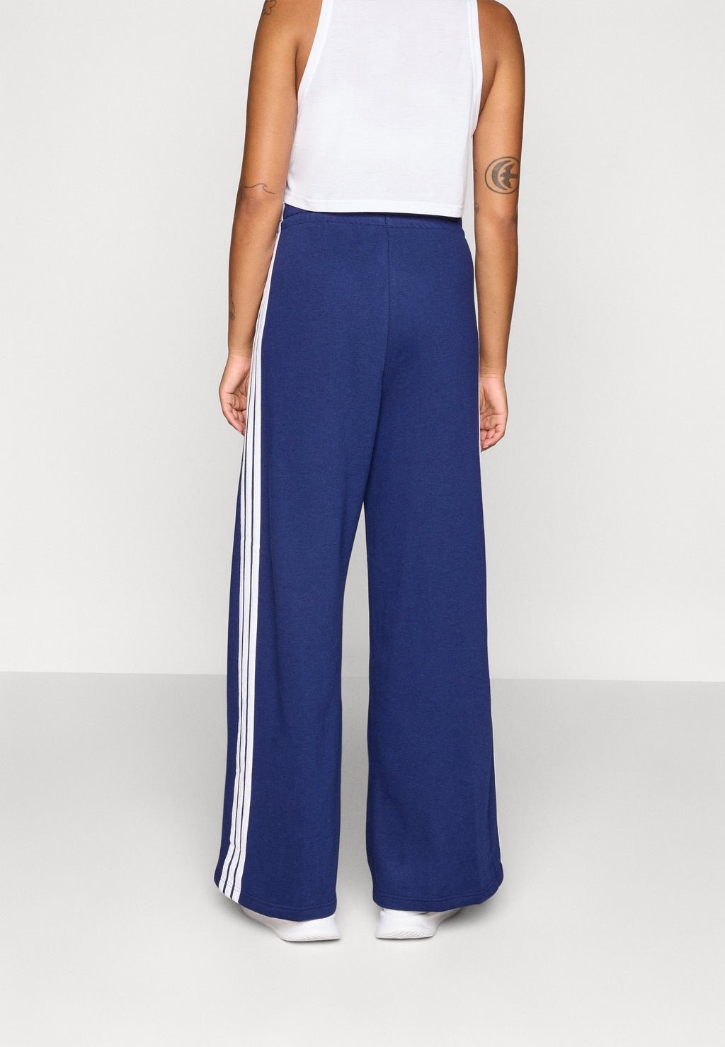 ADIDAS WOMEN 3-STRIPES FLEECE WIDE - Tracksuit bottoms - dark blue