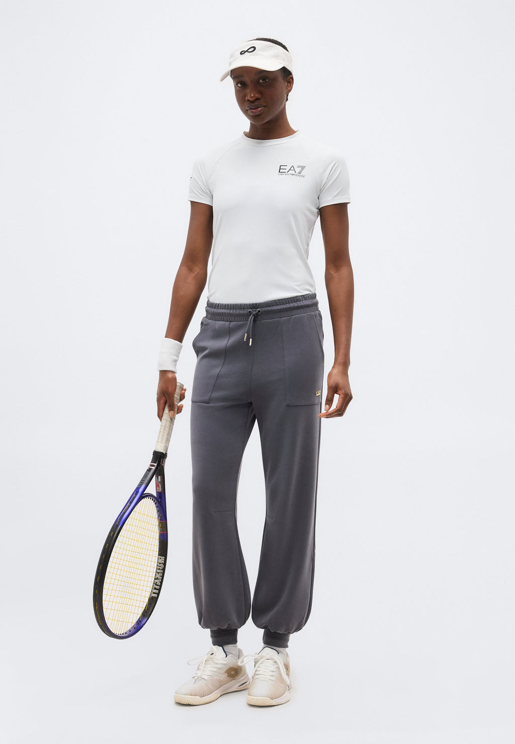 TRAIN CORE LADY RELAX - Tracksuit bottoms - gray